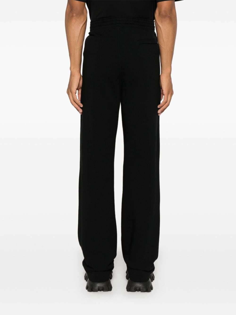 logo-embossed track pants - 4