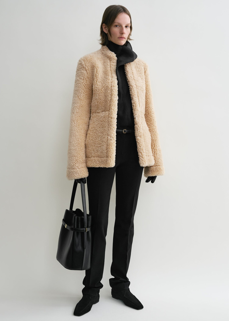 Totême Cinched shearling jacket butter outlook