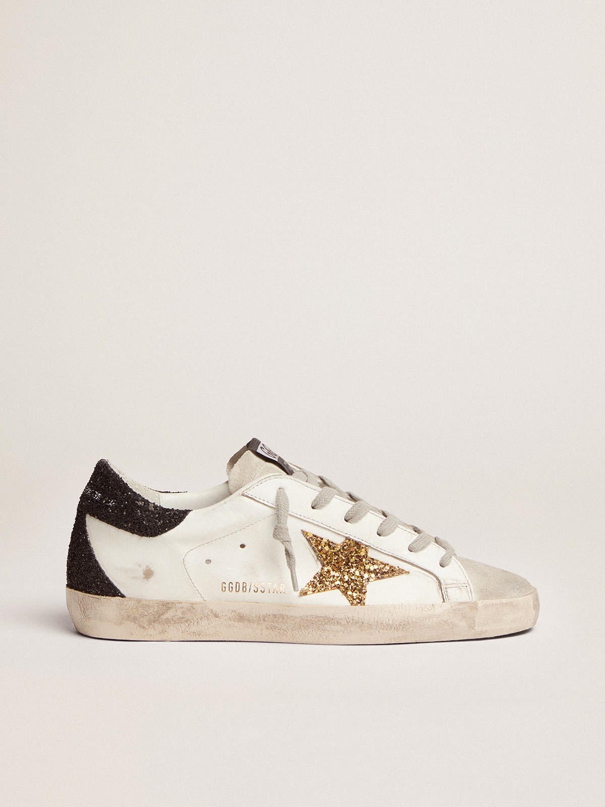 Golden Goose Super-Star sneakers with gold star and glittery
