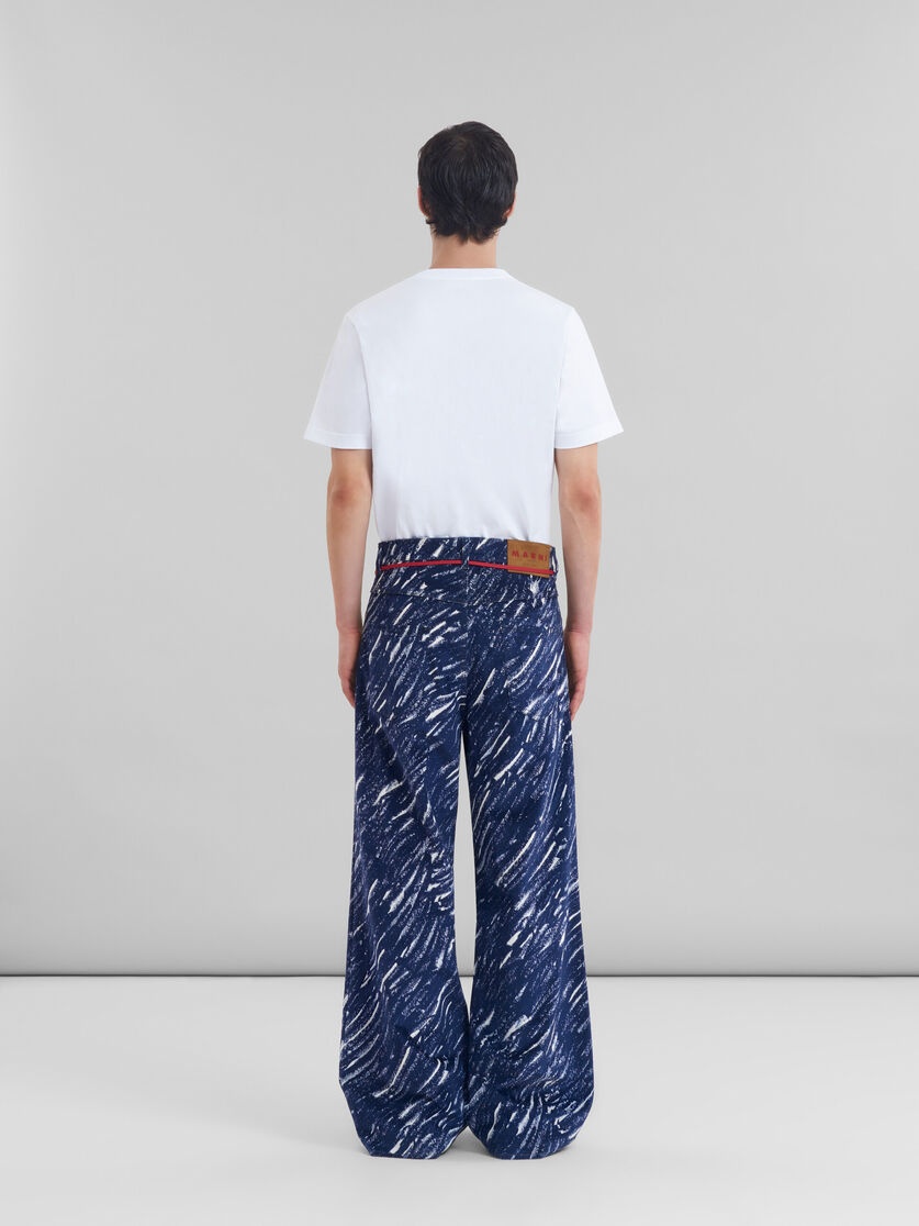 BLUE FLOCKED DENIM FLARED JEANS WITH CRAYON PRINT - 3