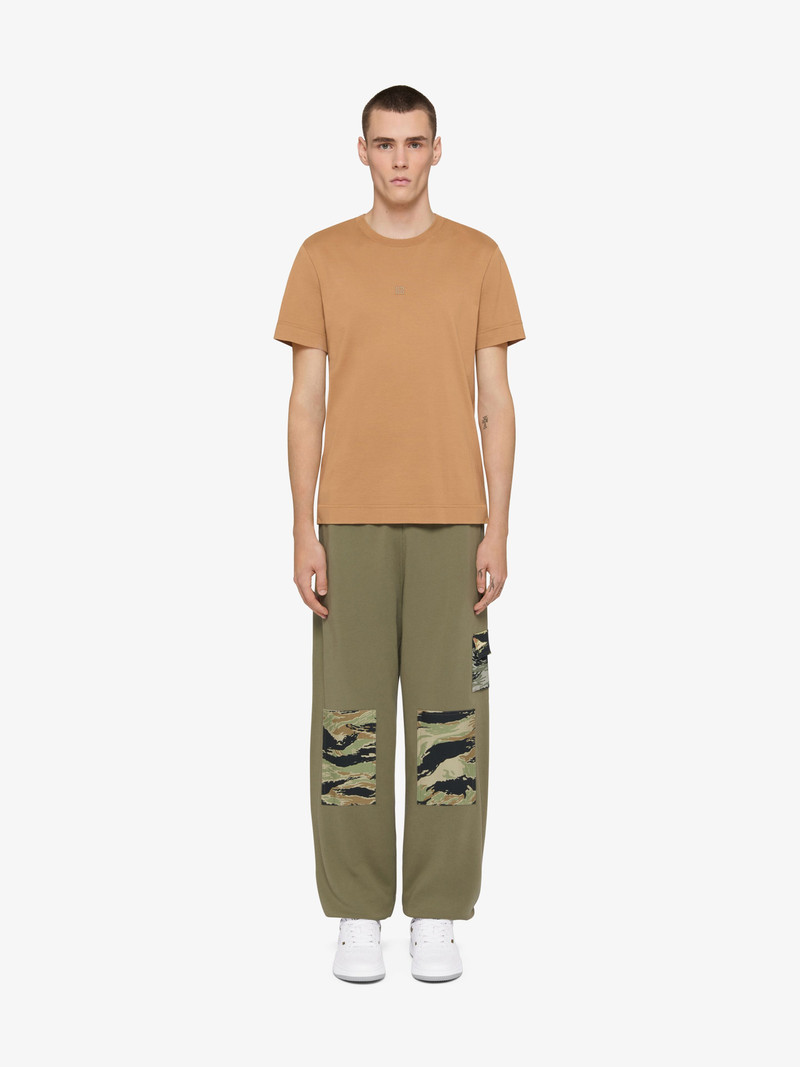 Givenchy JOGGER PANTS IN FLEECE WITH CAMO PATCHES outlook