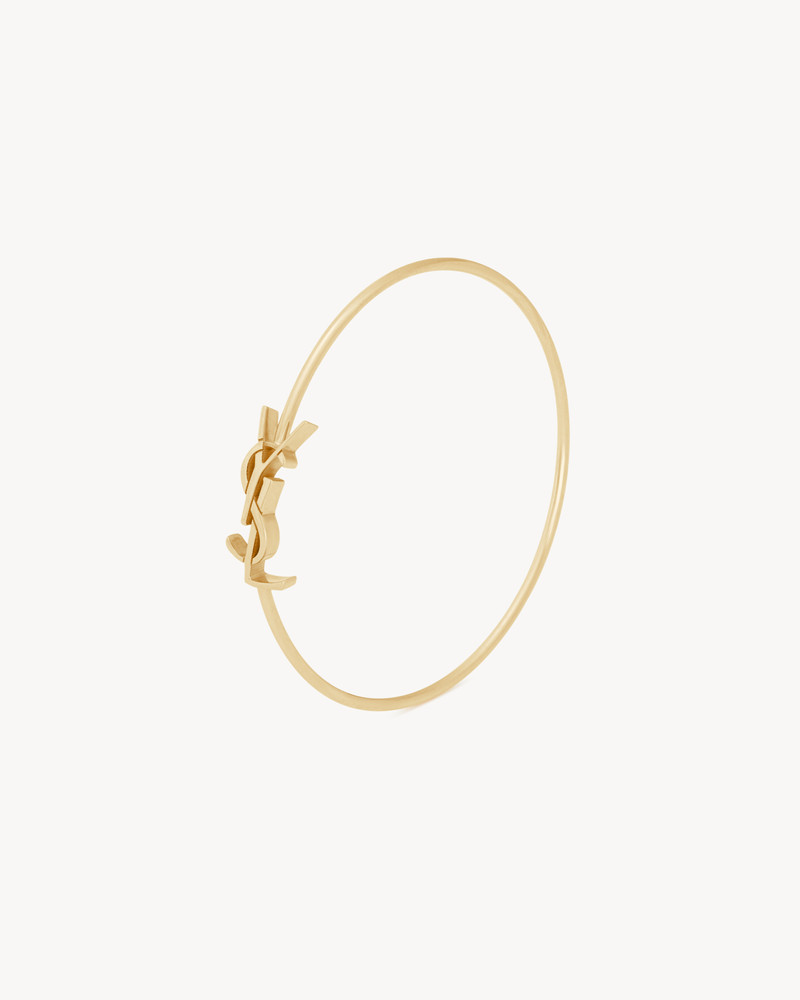 SAINT LAURENT CASSANDRE BANGLE IN 18K YELLOW GOLD outlook