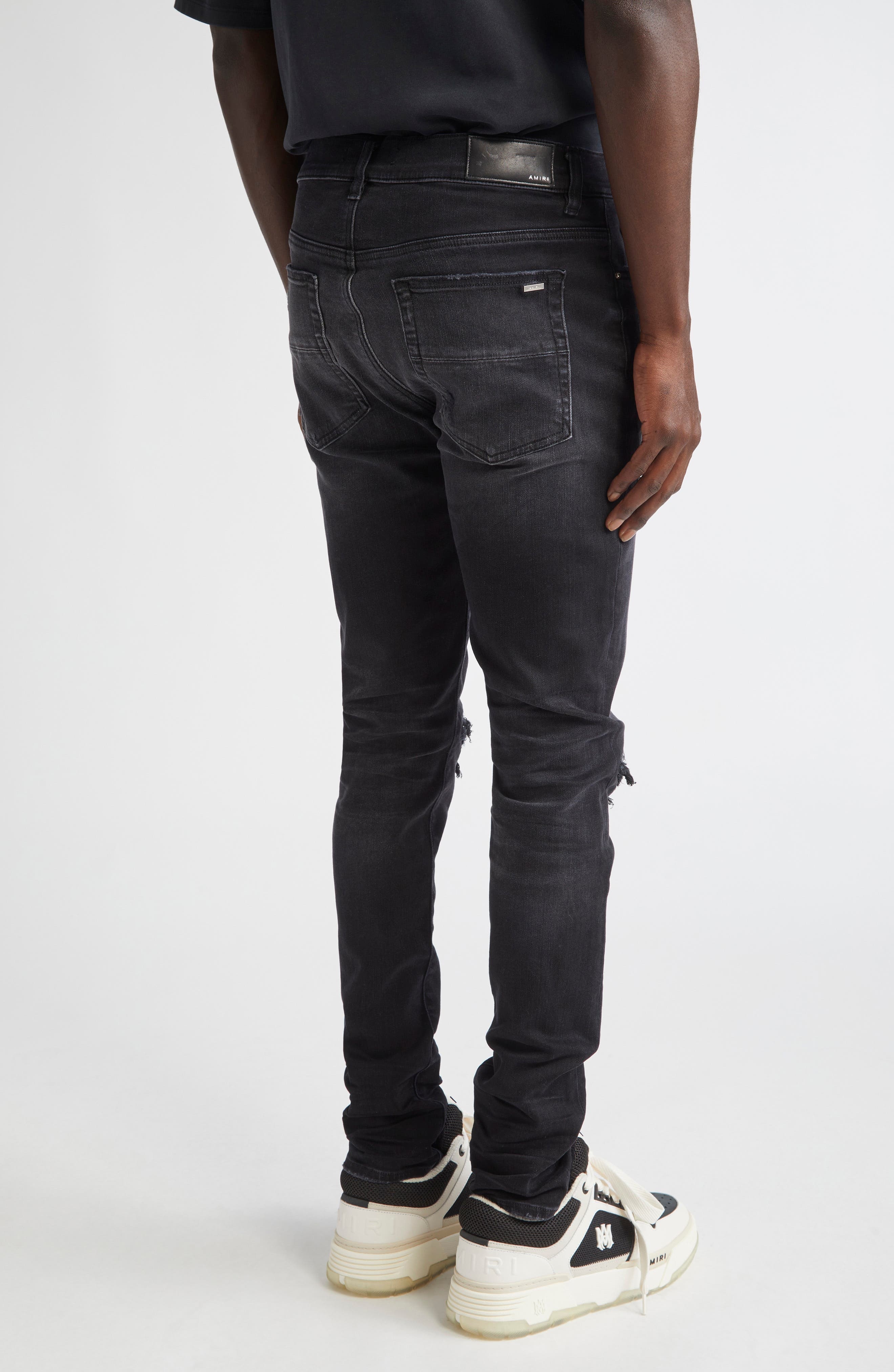 AMIRI MX1 Ultrasuede Patched Skinny Jeans in Vintage Black at Nordstrom - 3
