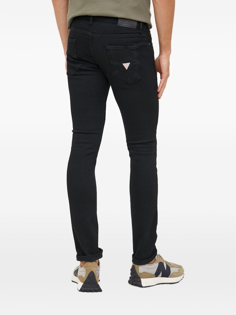Miami logo-patch jeans 3
