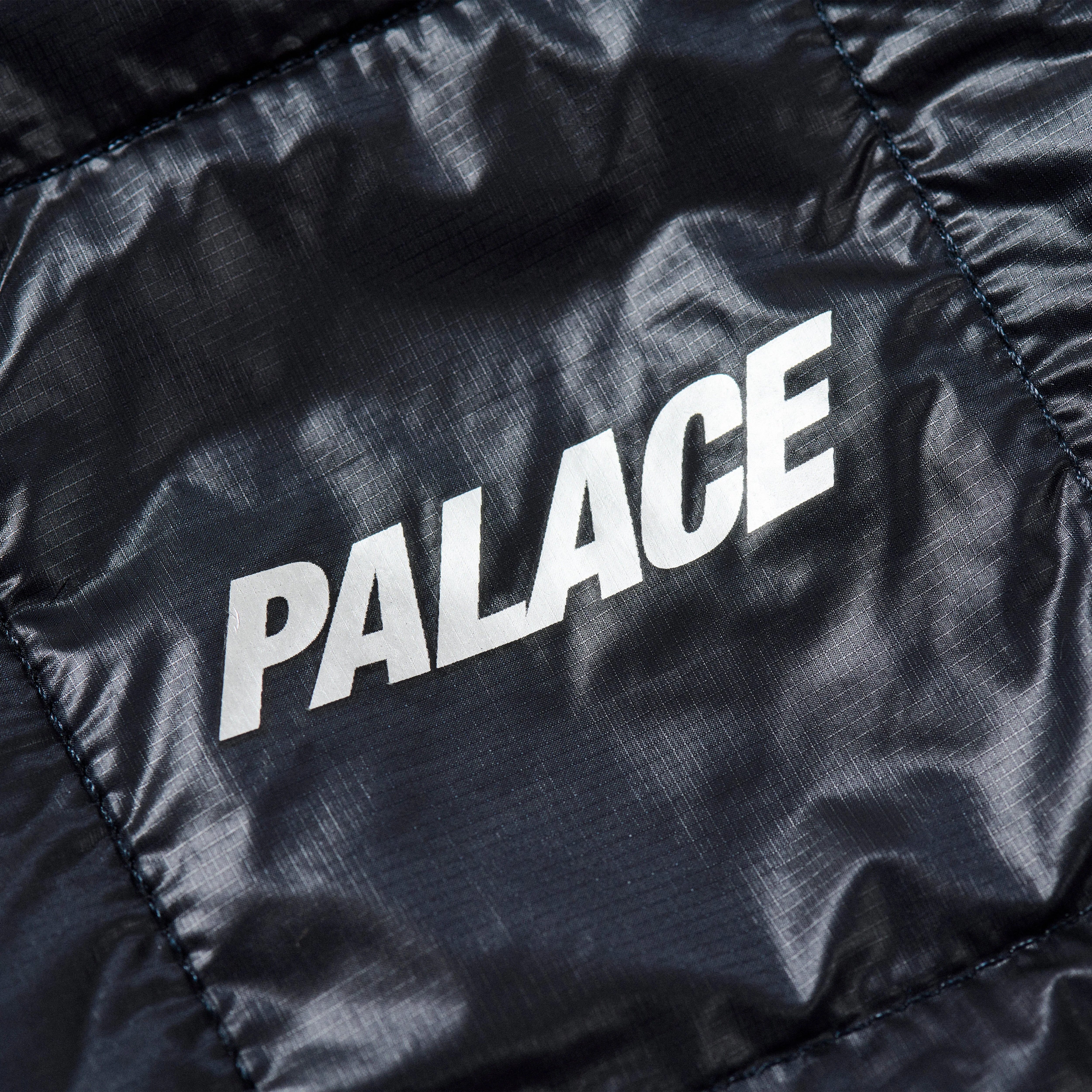 PALACE PERTEX NETPLUS MICROLITE JACKET BLACK / CARBON | REVERSIBLE