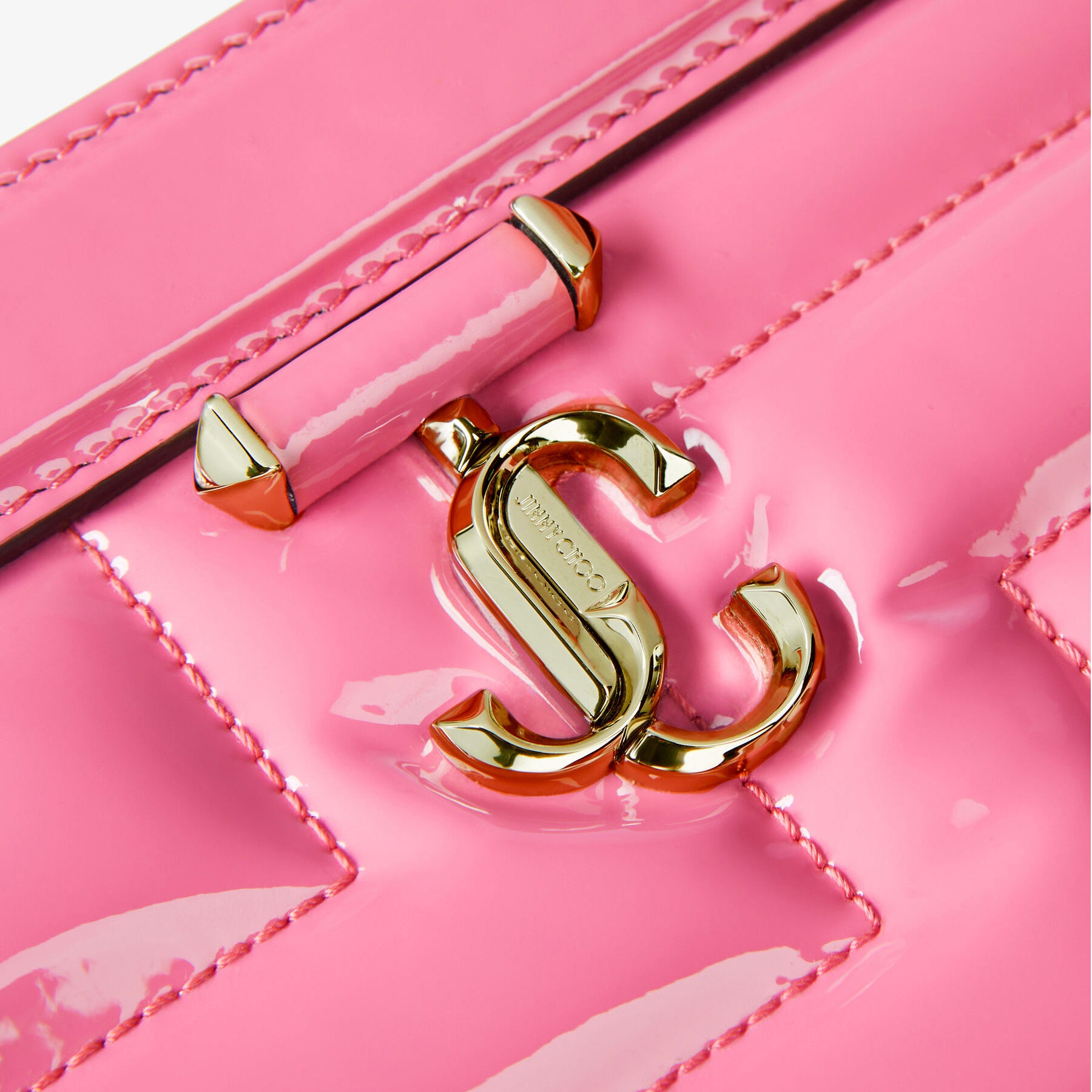 Varenne Avenue Pouch
Candy Pink Quilted Patent Pouch - 4