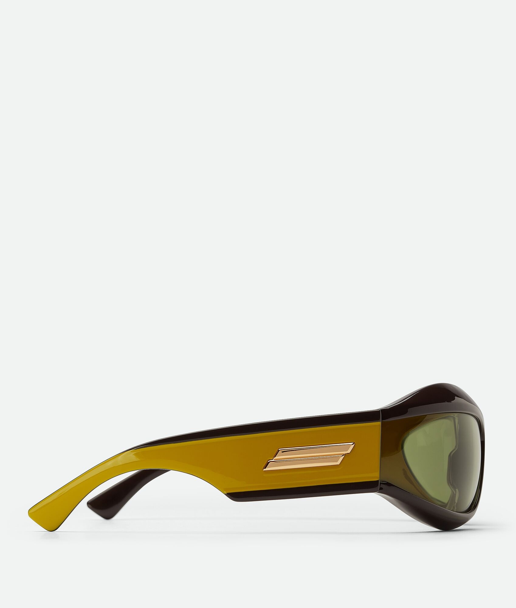 Bottega Veneta® Cangi Wraparound Injected Acetate Sunglasses in Yellow /  Bronze. Shop online now.