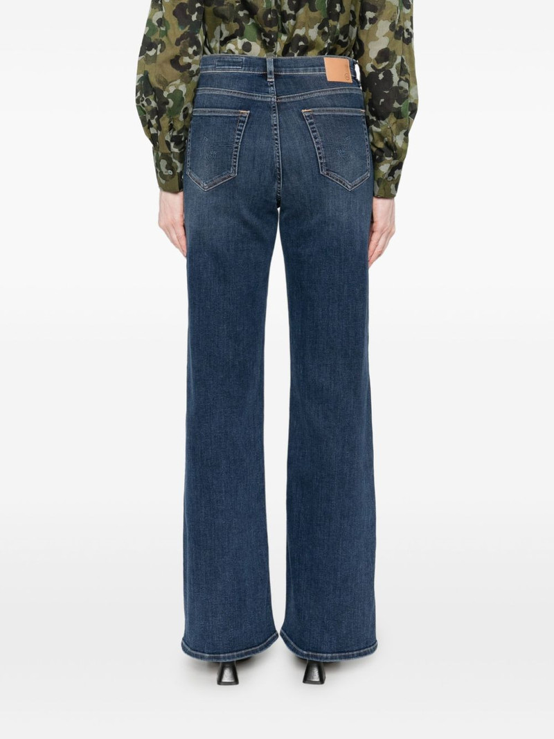 whiskering-effect jeans 4