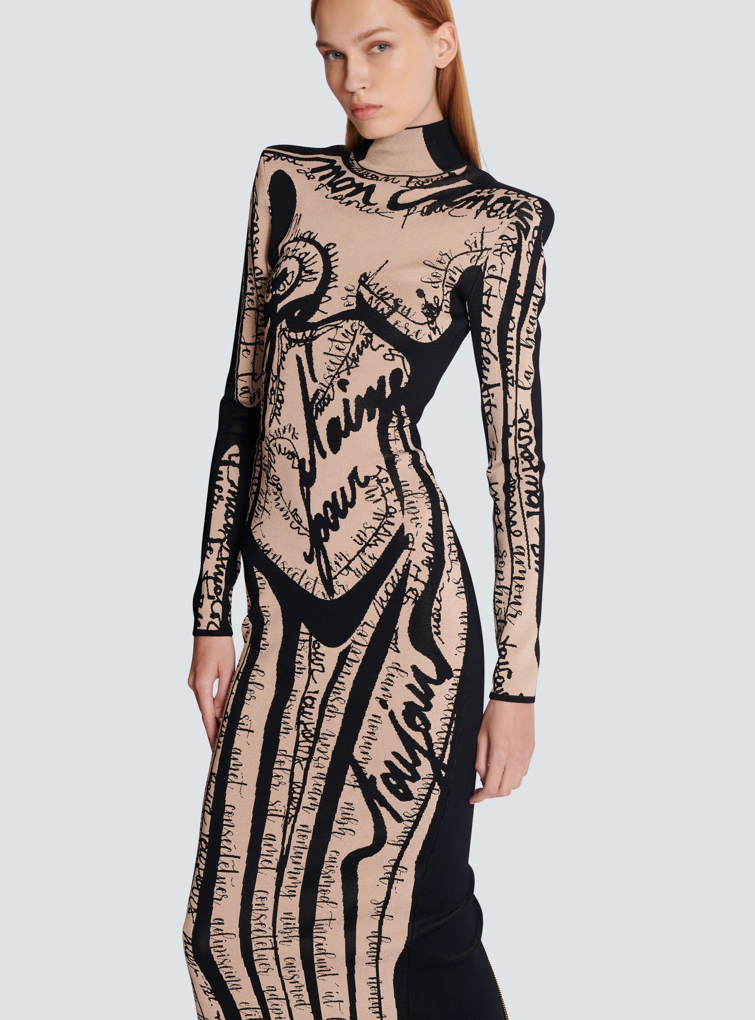 Long knit dress with body motif - 6