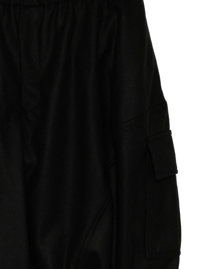 BLACK COMME des GARÇONS asymmetric pocket skirt outlook