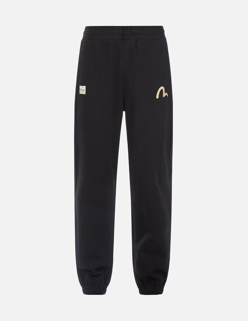 NOMADIC PATTERN AND DARUMA DAICOCK PRINT SWEATPANTS 1