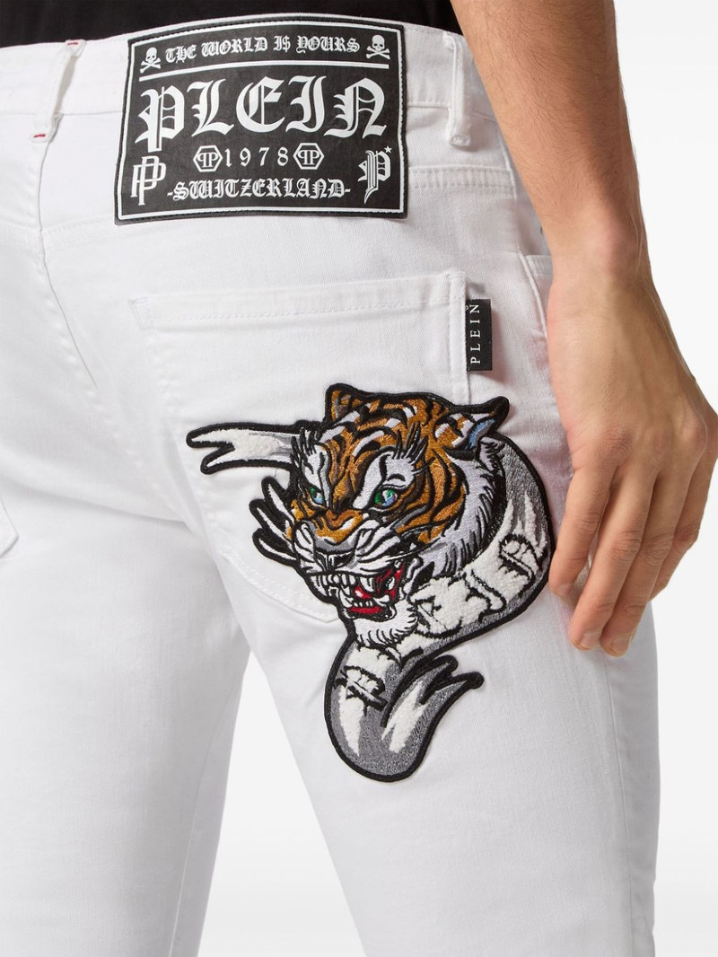 tiger-appliquÃ© straight-leg jeans 4