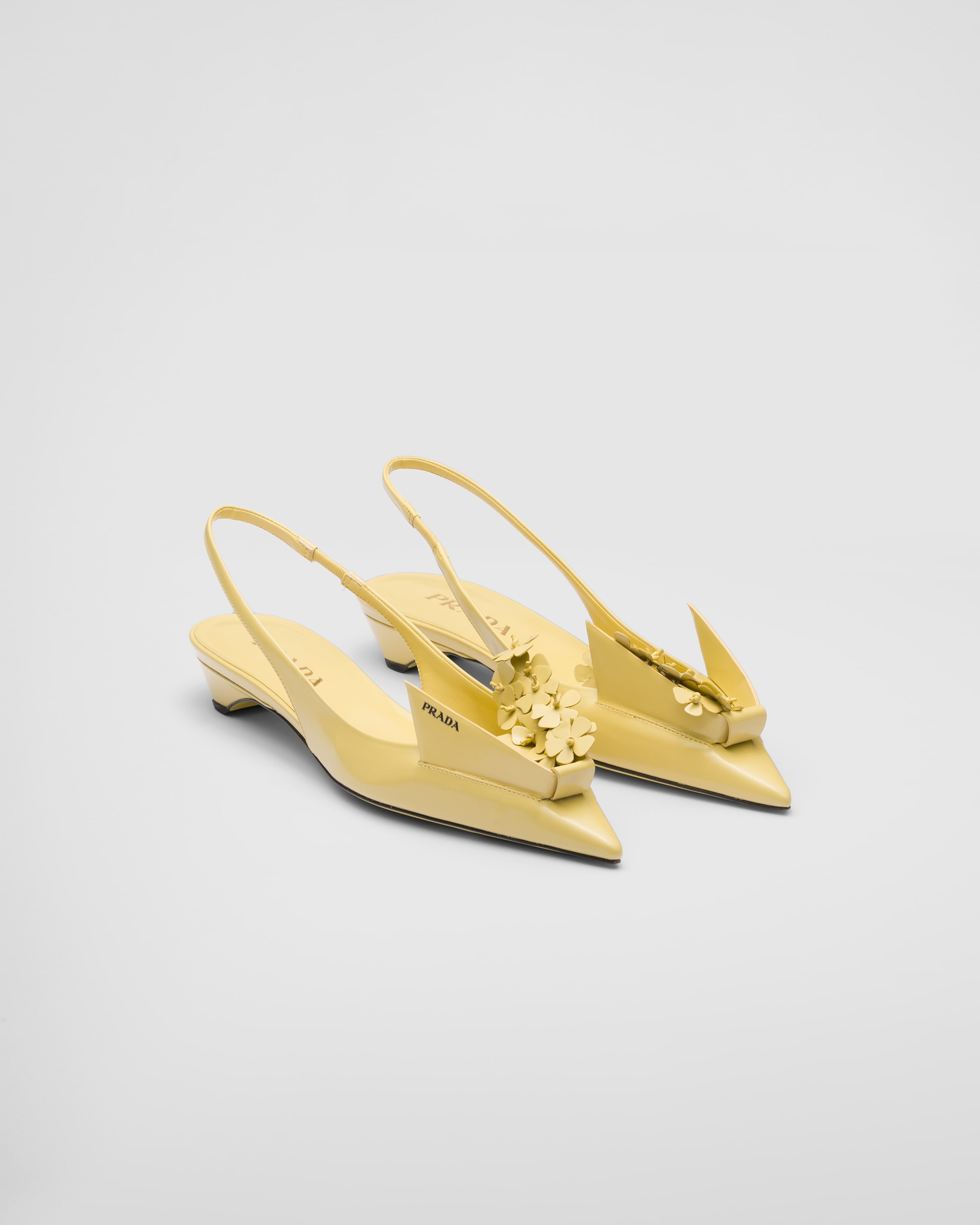 Brushed leather slingback pumps with floral appliques - 1