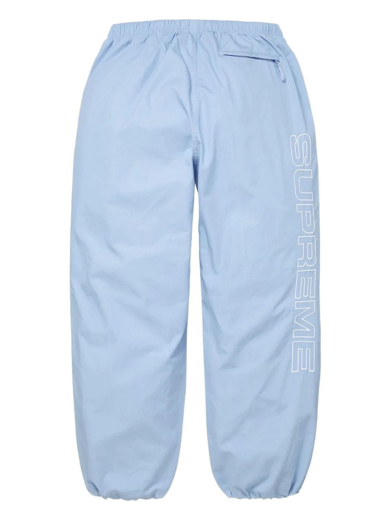 Supreme logo-print track trousers outlook