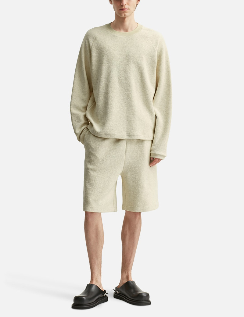 AMI Paris RAGLAN SLEEVED CREWNECK SWEATSHIRT outlook