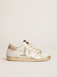 Golden Goose Women's Super-Star sneakers with gold sparkle