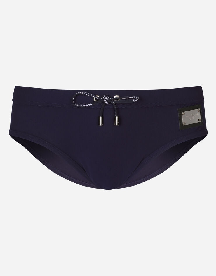 Swim briefs with high-cut leg and branded plate - 1