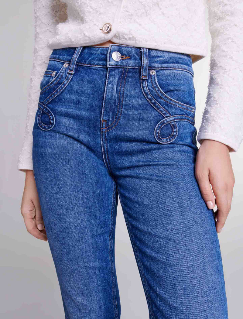 Embroidered flared jeans 6