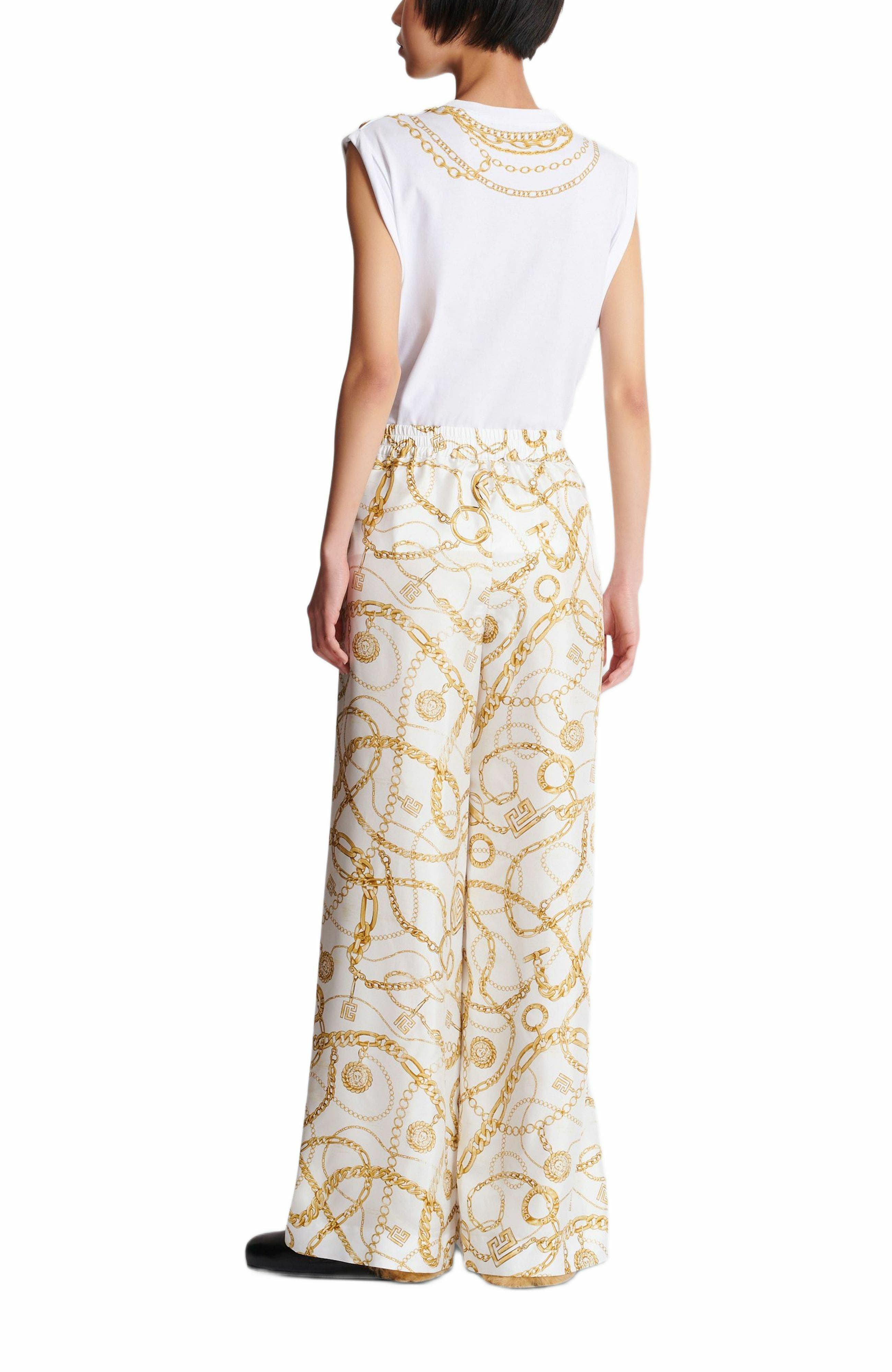Flowing printed silk trousers with Balmain Chains pattern in Gold at Nordstrom - 3