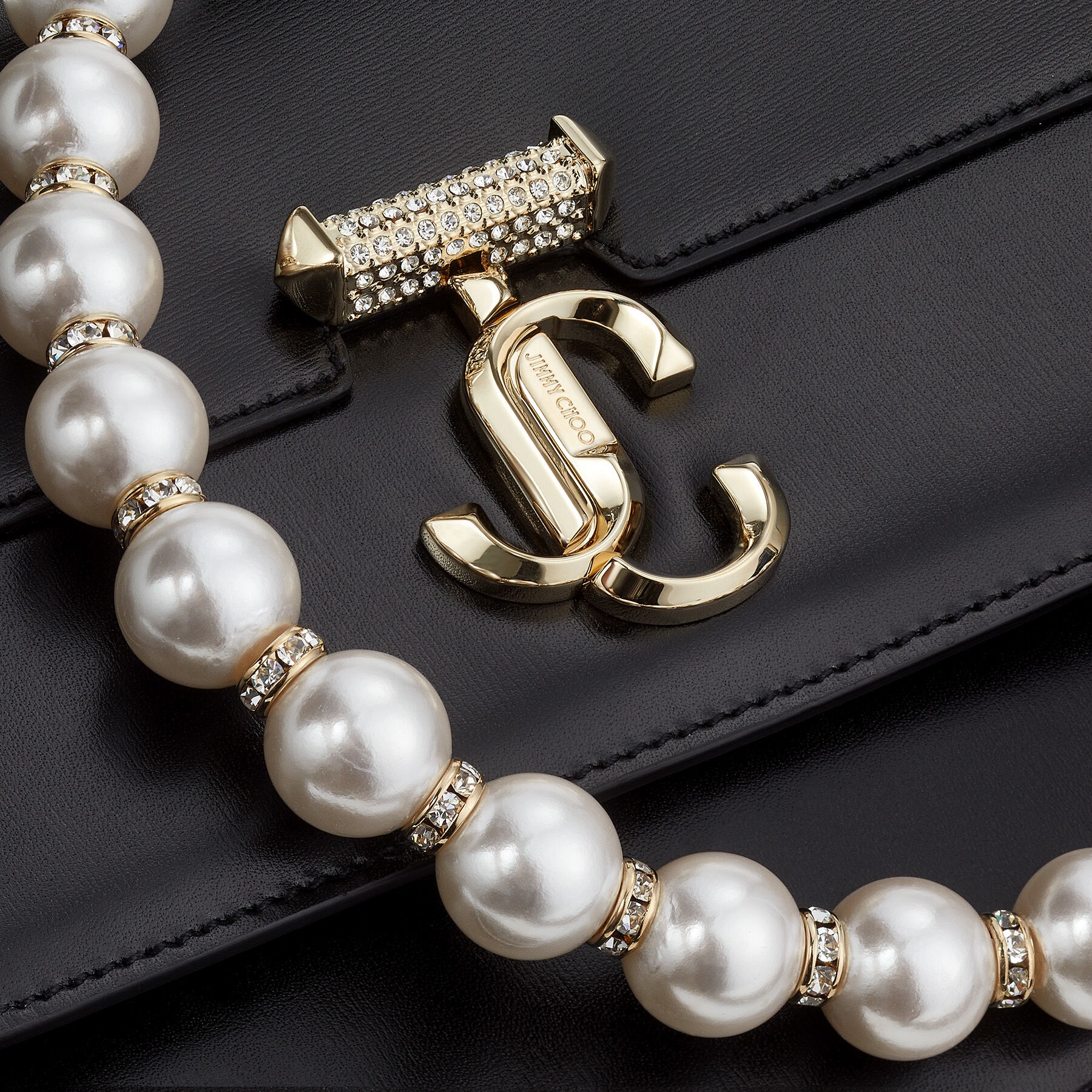 Varenne Quad XS
Black Leather Shoulder Bag with Pearl Strap - 6