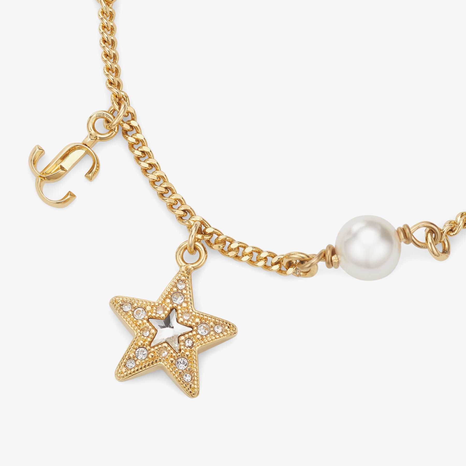 JC Star Bracelet
Gold-Finish Metal Bracelet with Pearl, Star and JC Monogram Charms - 3