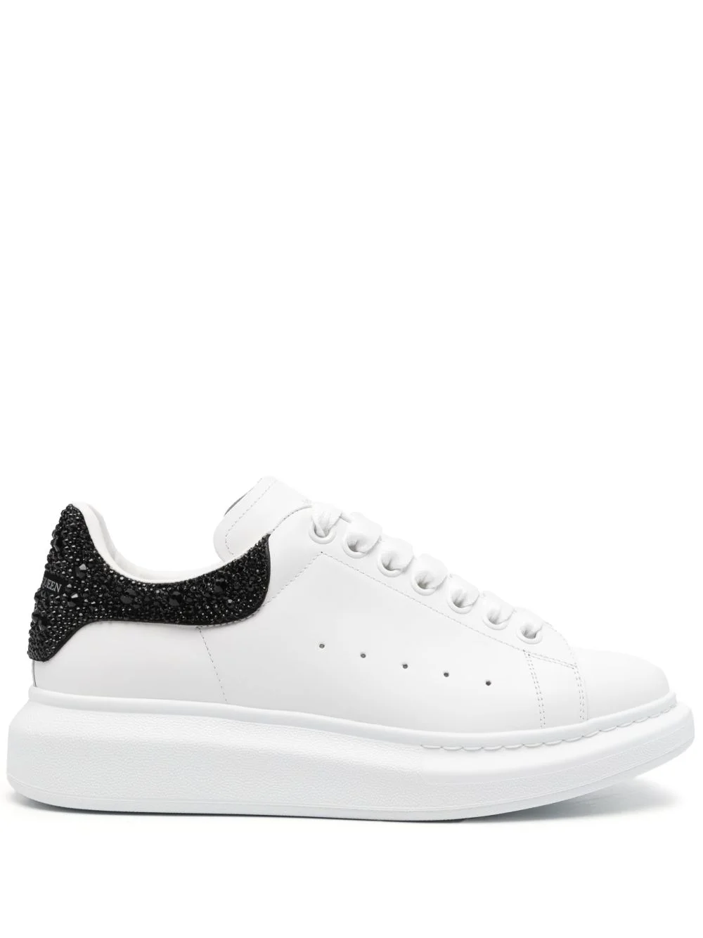 Oversized studded low-top sneakers - 1