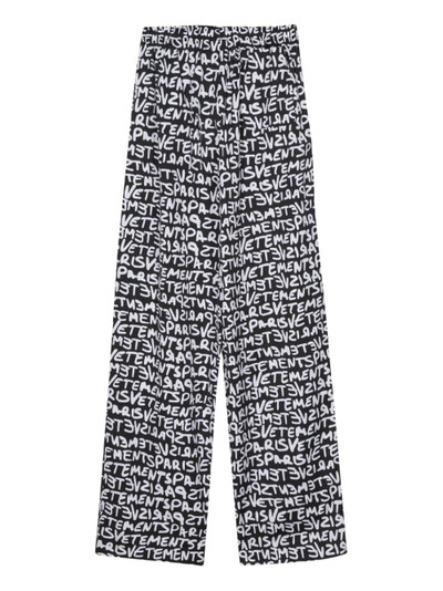 VETEMENTS cotton logo-print straight trousers outlook
