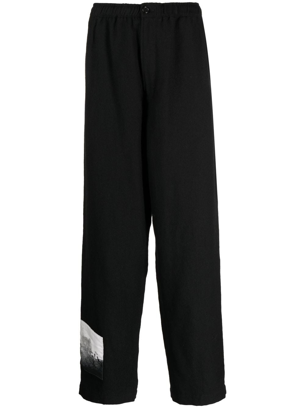 graphic-patch wool trousers - 1