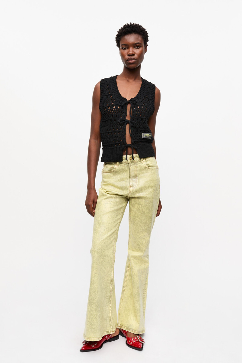 GANNI YELLOW FOIL OVERDYED DENIM JEANS outlook