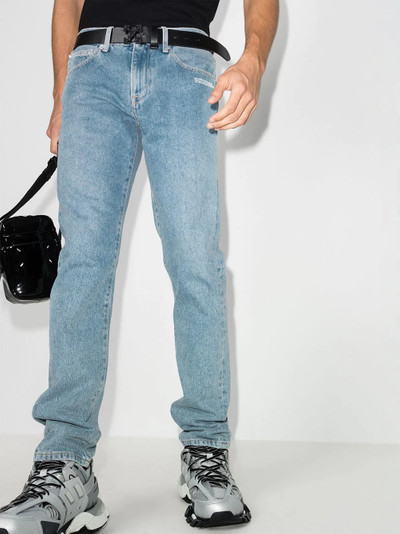 Off-White logo-print slim-leg jeans outlook