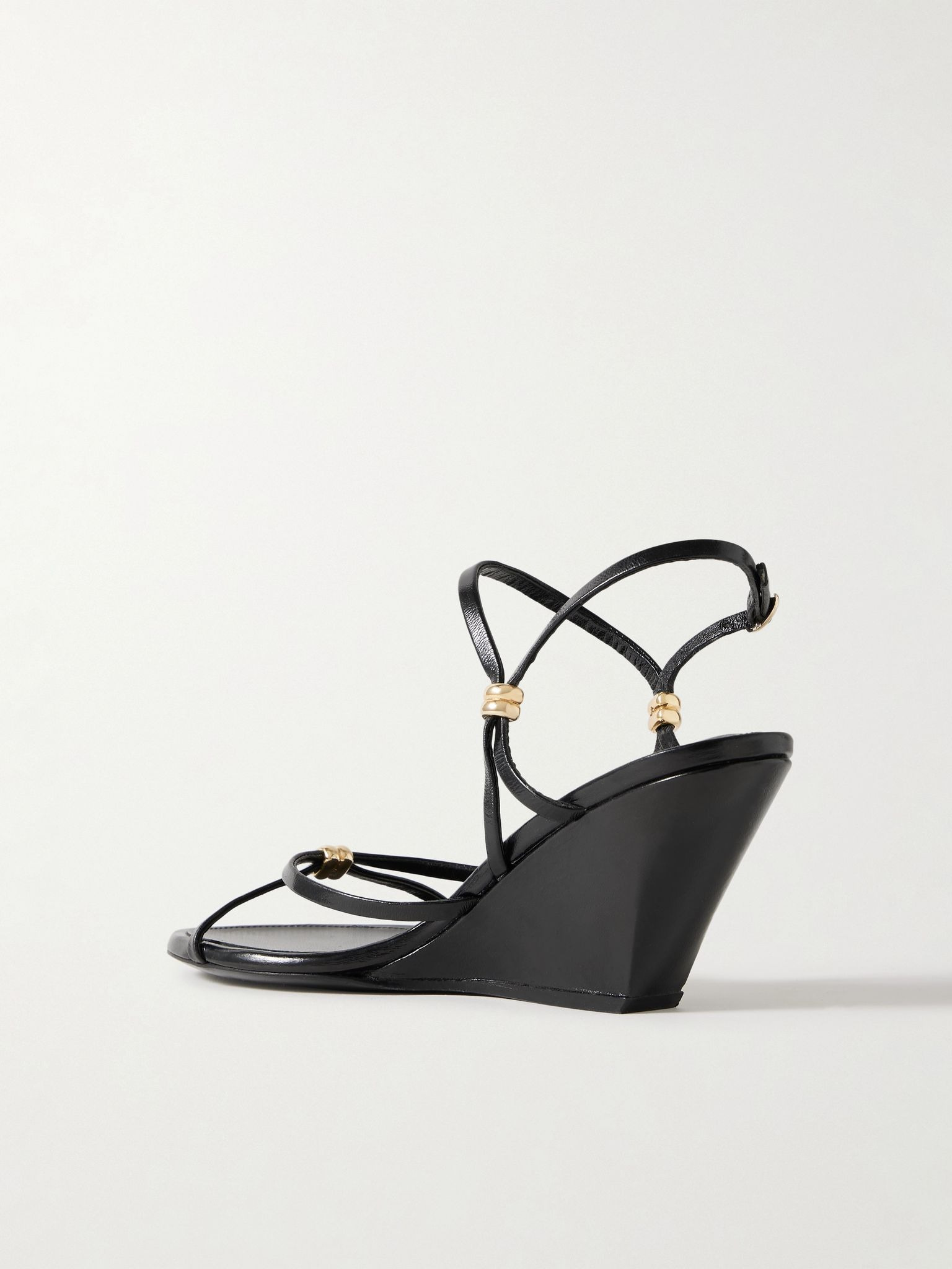 Coil embellished crinkled glossed-leather wedge sandals Black - 3