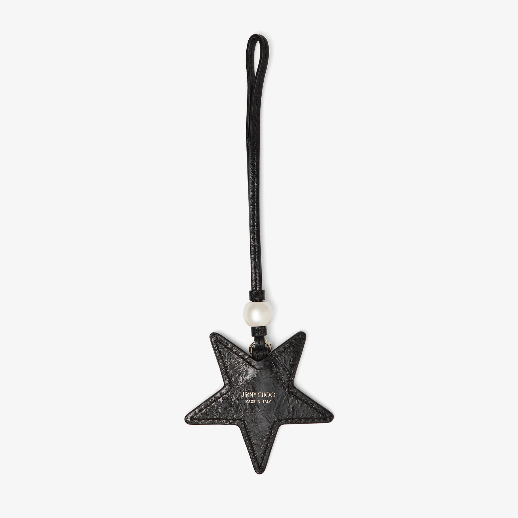 Star Charm
Natural Leopard Print Pony Star Bag Charm - 3