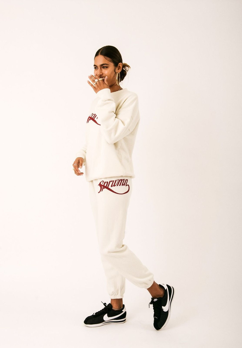 SPRWMN OFF WHITE COTTON LOGO SCRIPT SWEATPANTS outlook