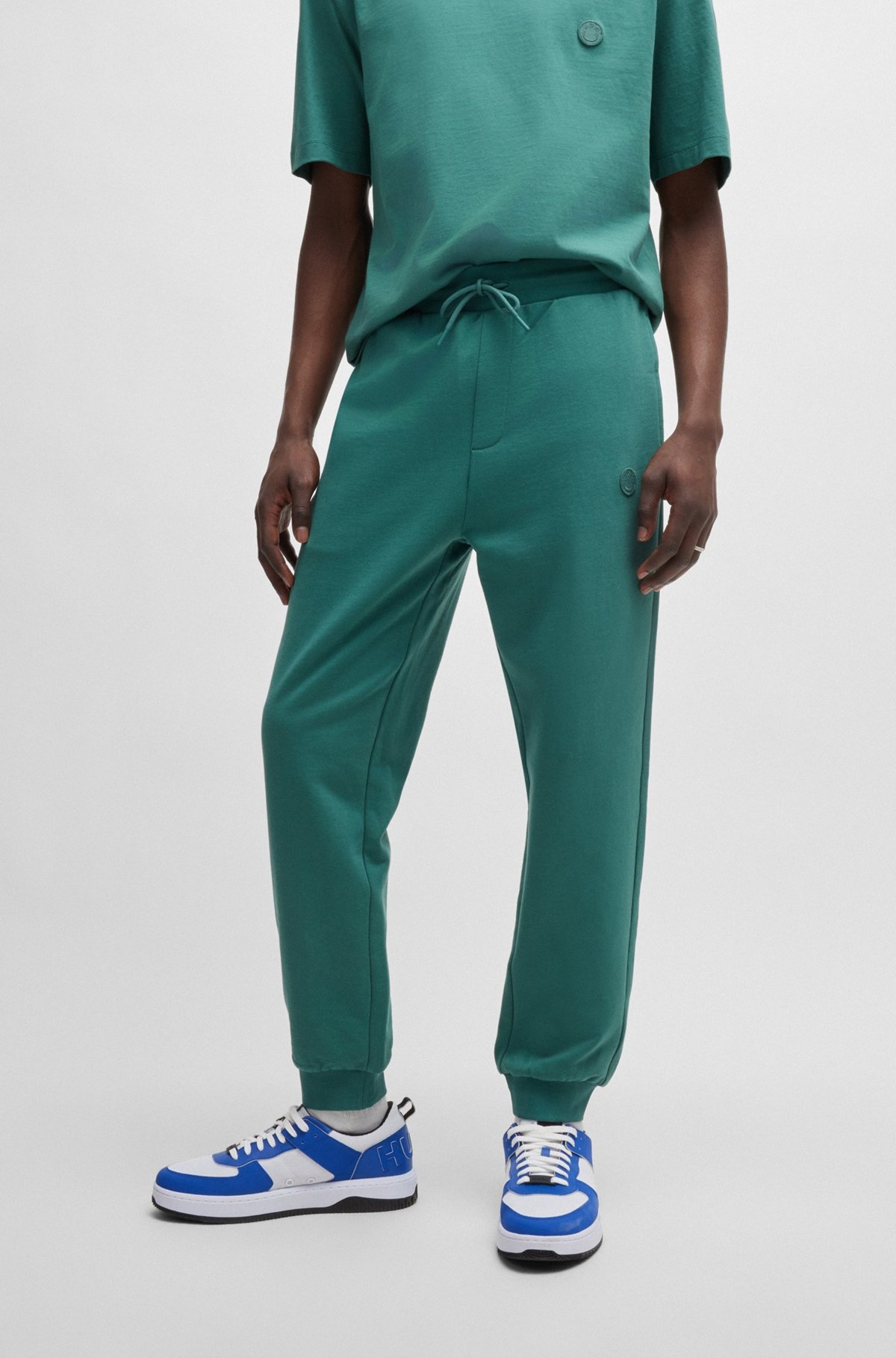 COTTON-TERRY TRACKSUIT BOTTOMS WITH HAPPY HUGO LOGO PATCH - 2