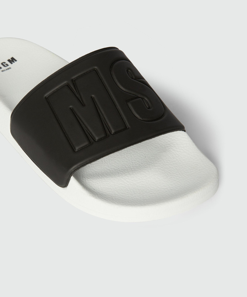Black and white pool slides with MSGM macrologue 4