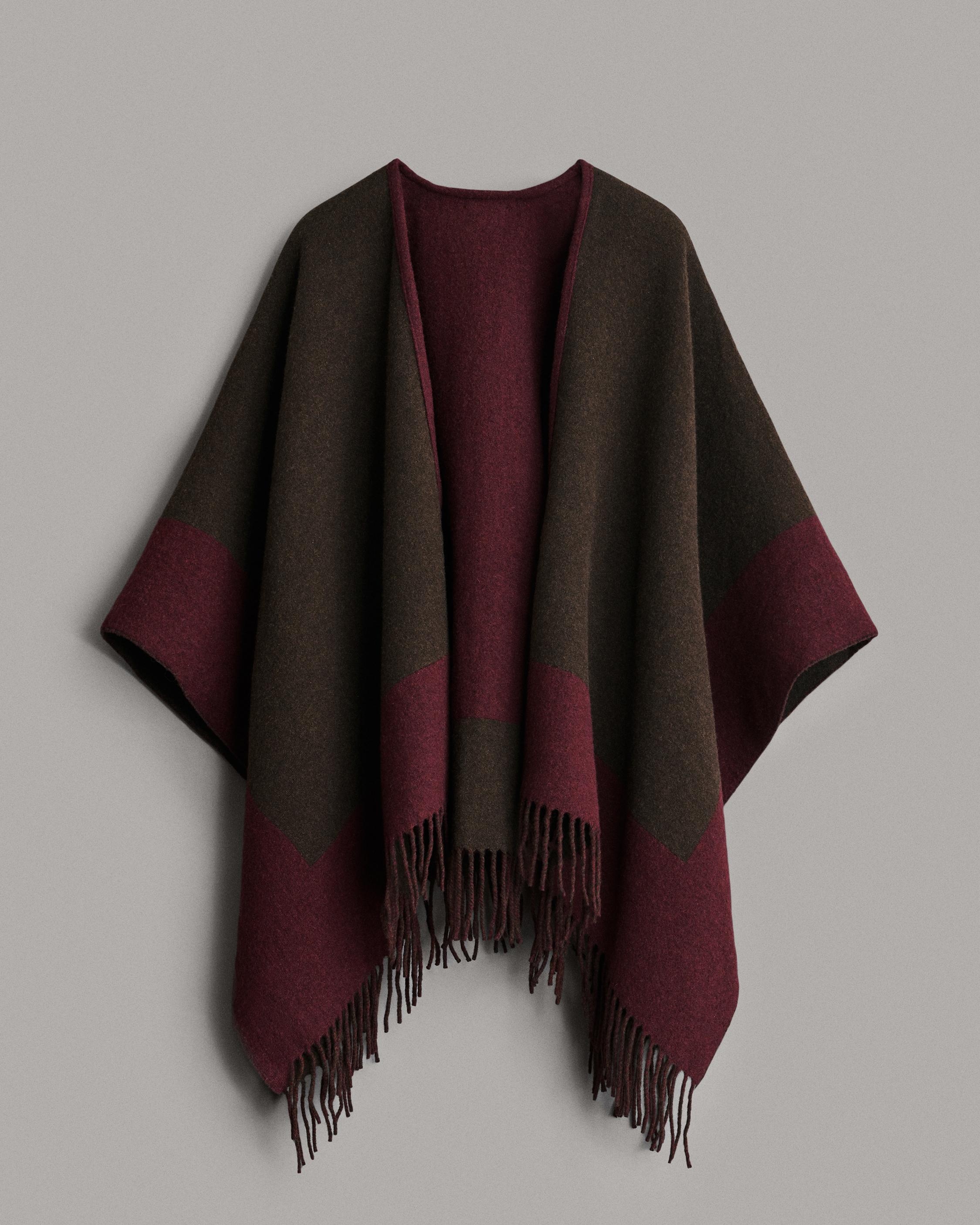 Highlands Wool Reversible Poncho
Midweight Poncho - 1