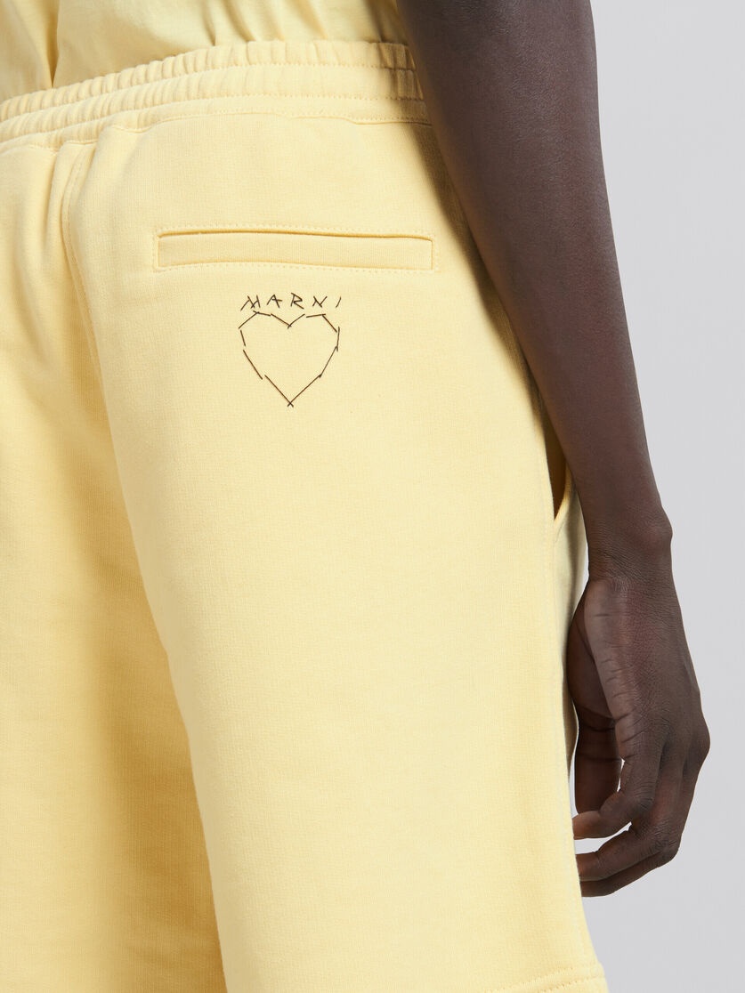 YELLOW ORGANIC JERSEY SWEAT SHORTS WITH MARNI MENDING - 4