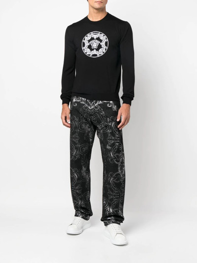 VERSACE all-over baroque-print denim jeans outlook