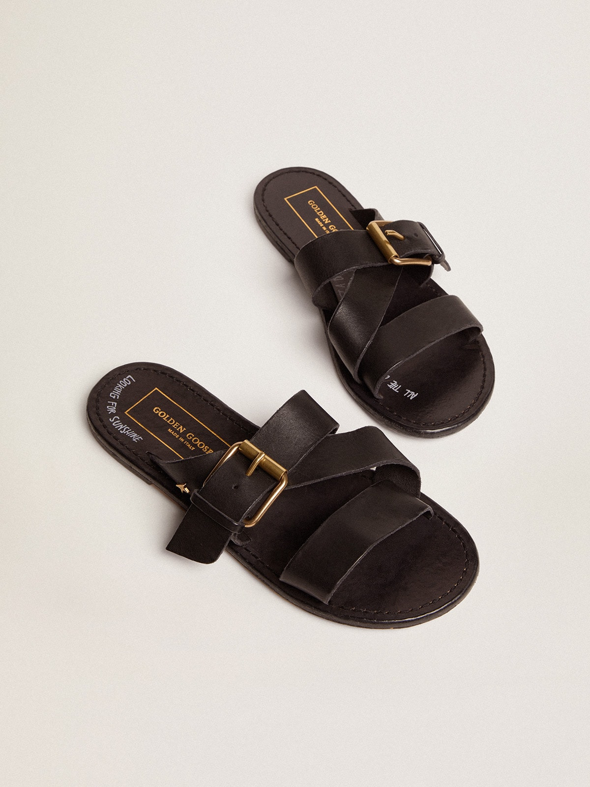 Women's flat sandals in black resin-coated leather - 2