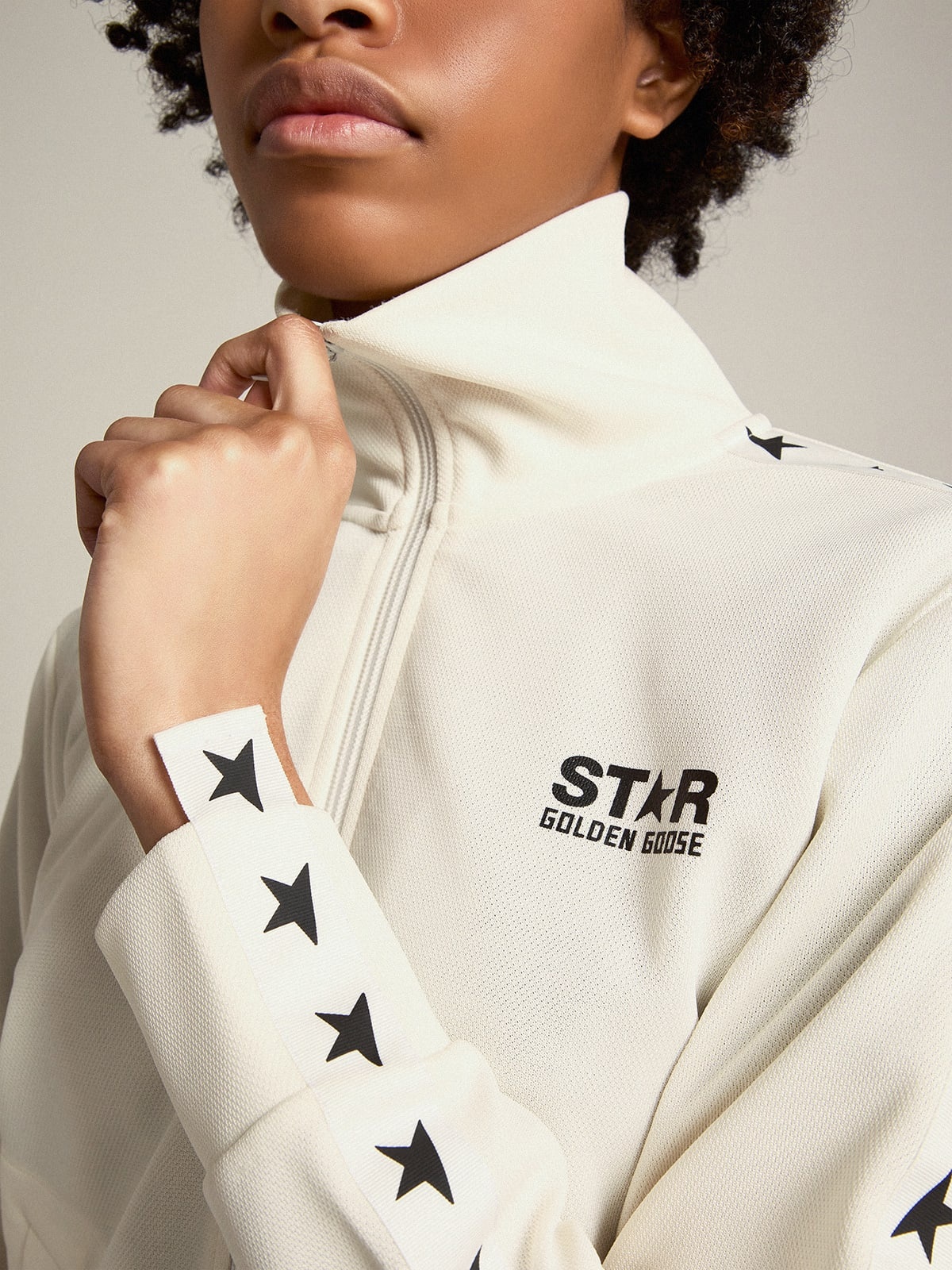 Women’s white zipped sweatshirt with white strip and black stars - 2