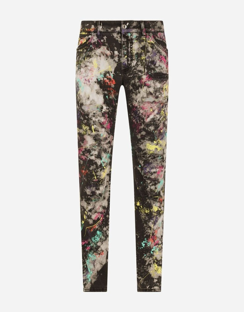 Slim-fit black stretch jeans with marbled print 1