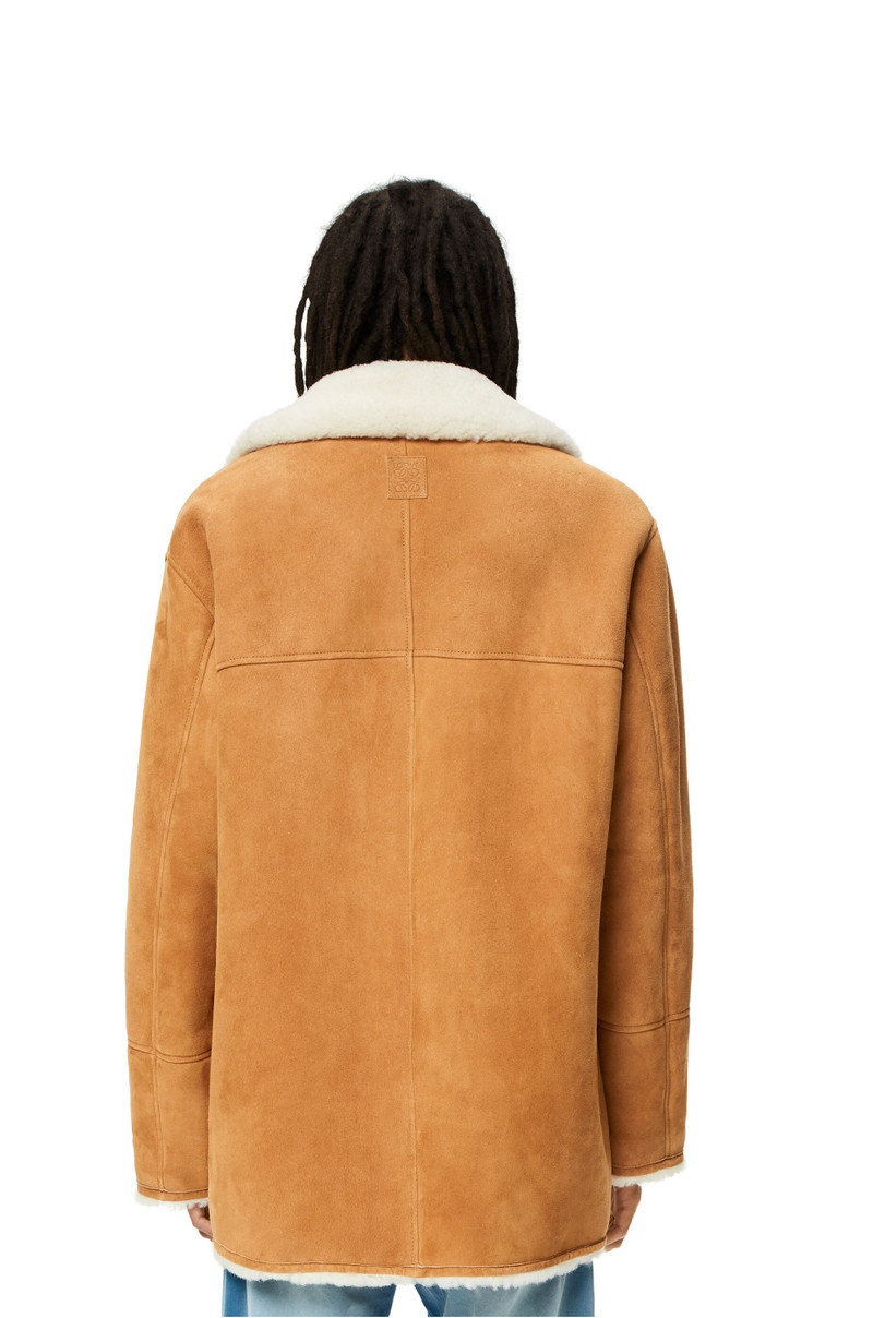 Coat in shearling 4