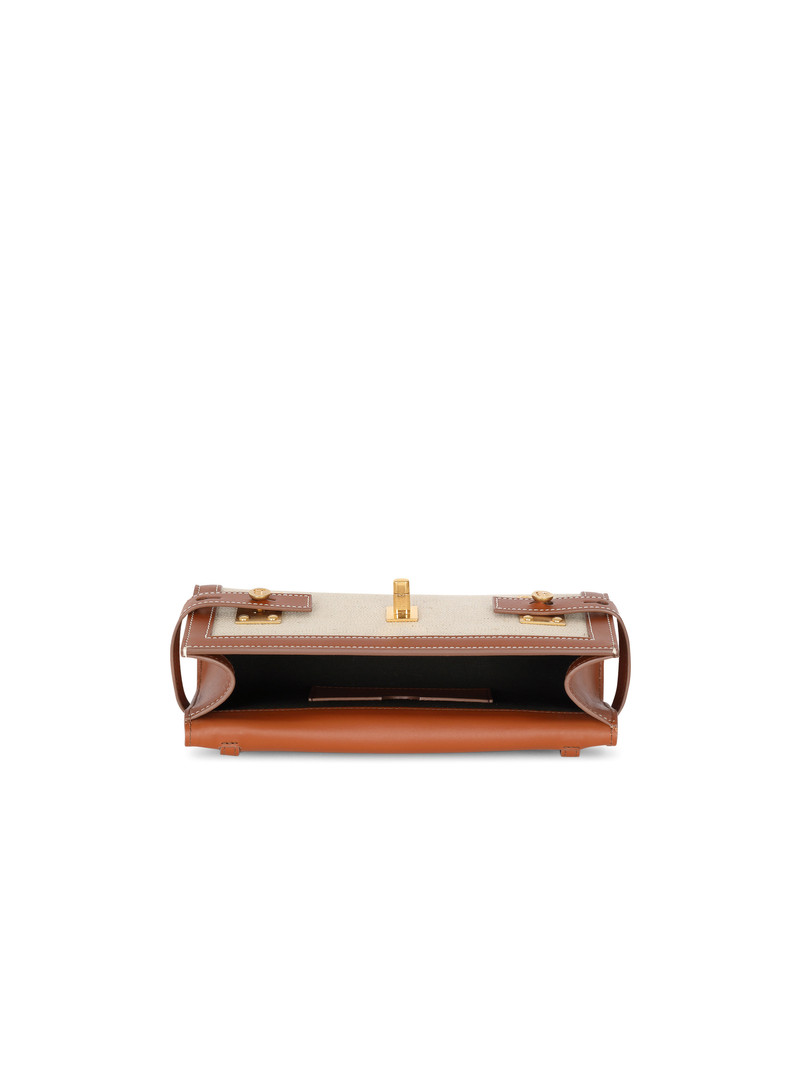 B-Buzz 23 leather and canvas clutch bag 4