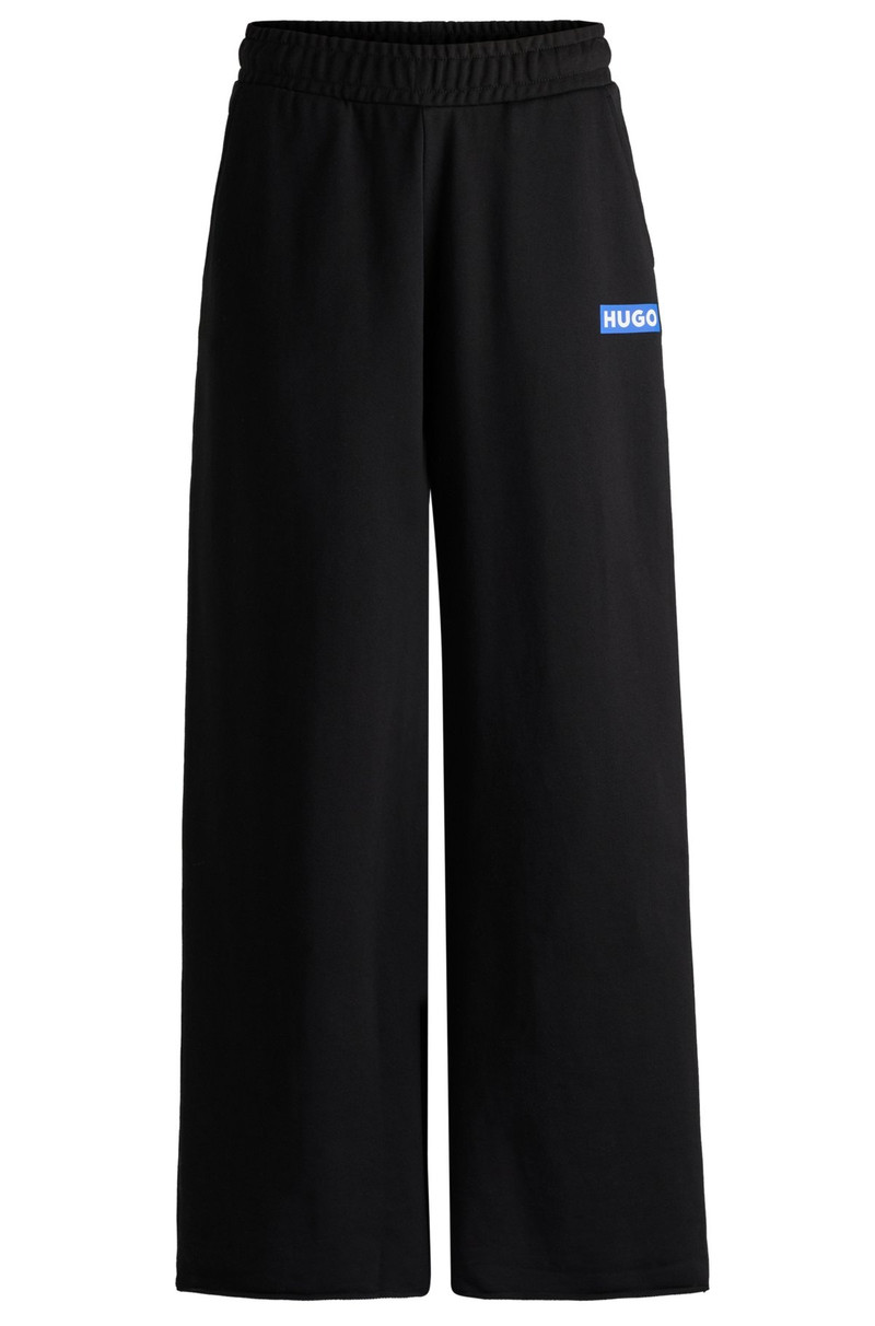RELAXED-FIT TRACKSUIT BOTTOMS WITH LOGO PRINT 1