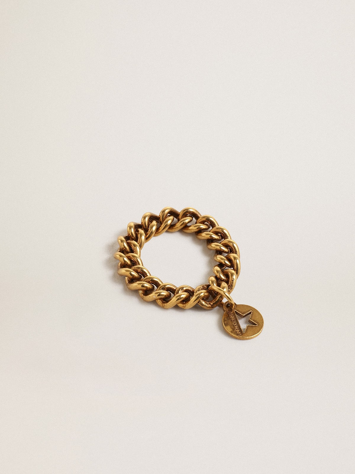 Ring in old gold color with flexible links - 1