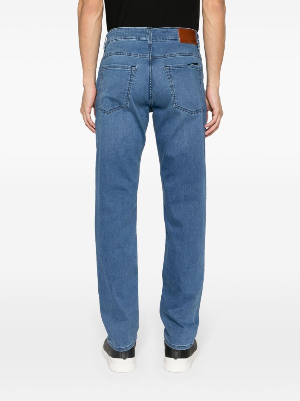 low-rise tapered-leg jeans - 4