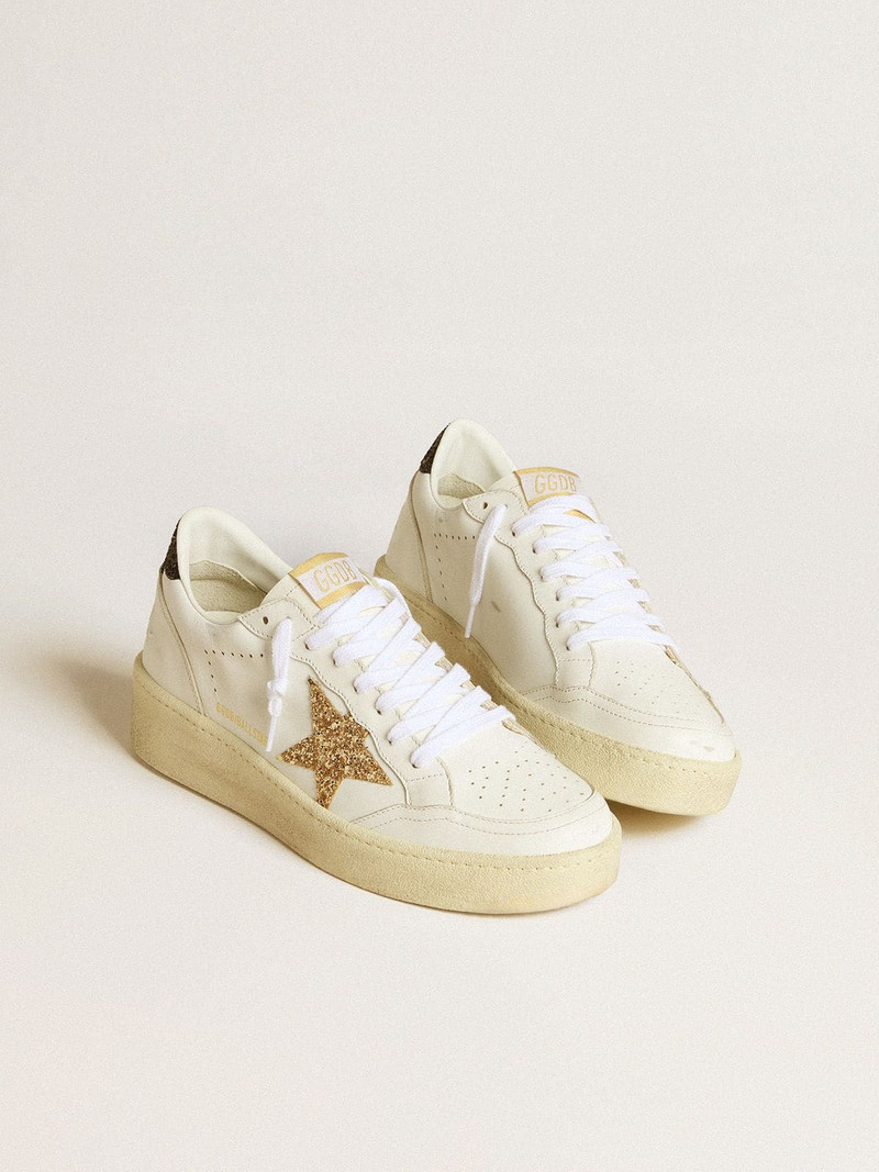 Golden Goose Women’s Ball Star in white leather with gold glitter star and black glitter heel tab outlook