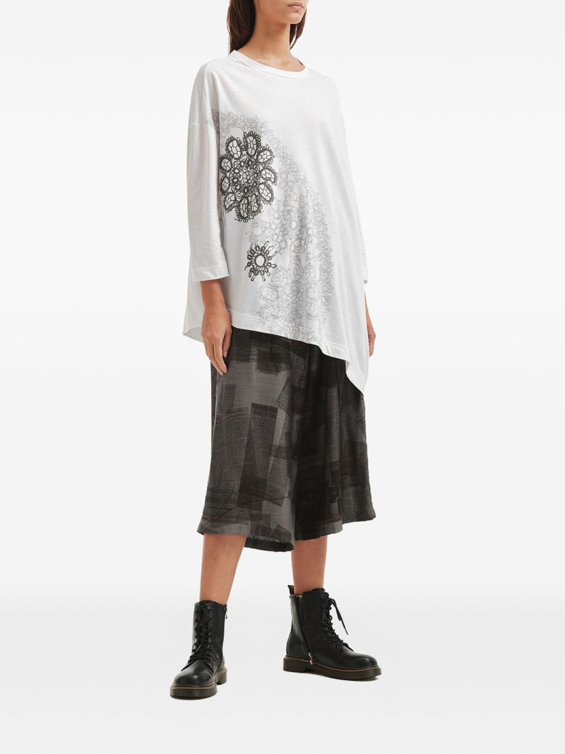 Y's newspaper-print wide-leg trousers outlook