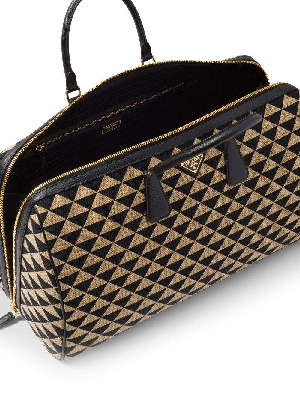 Symbole embroidered fabric travel bag - 5