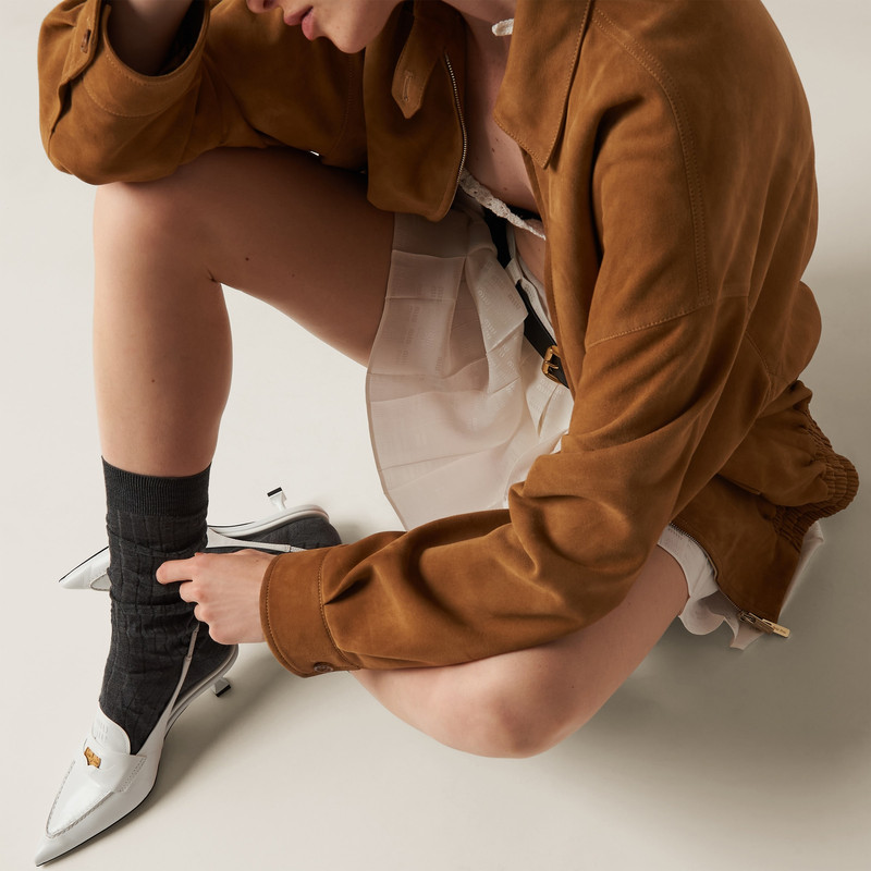 Miu Miu Leather penny loafers with heel outlook